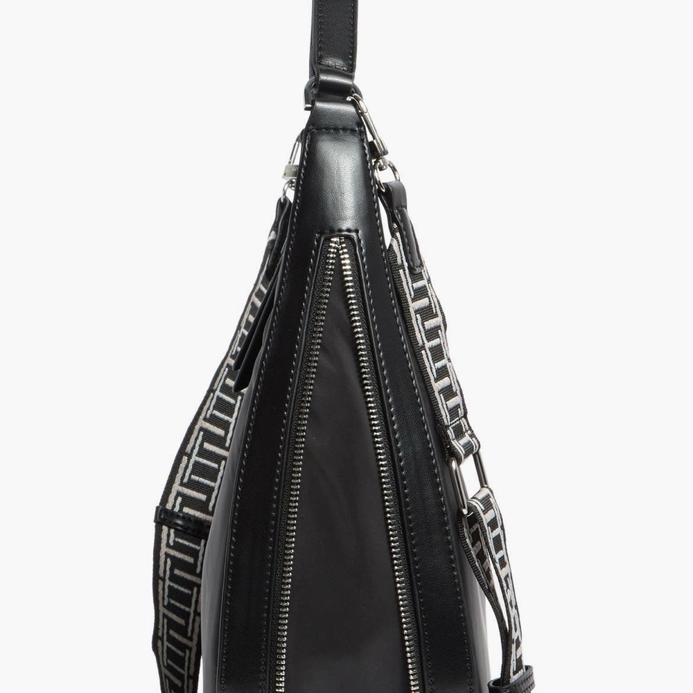 Tahari
Minetta Expandable
Crescent Bag NWT - Picture 4 of 6